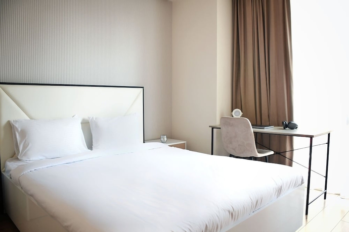 Imagen de la habitación del Hotel Modern Gem Steps to Republic Square. Foto 4