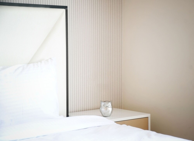 Imagen de la habitación del Hotel Modern Gem Steps to Republic Square. Foto 5