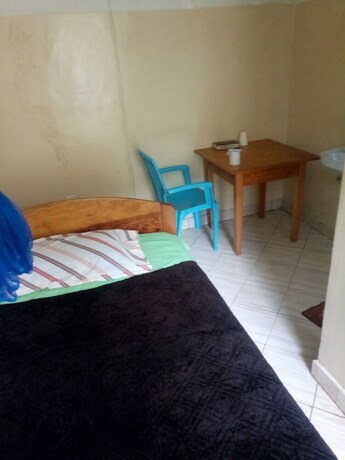 Imagen de la habitación del Hotel Modern Guest House. Foto 13