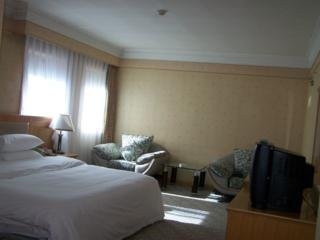 Imagen de la habitación del Hotel Modern, Harbin. Foto 6