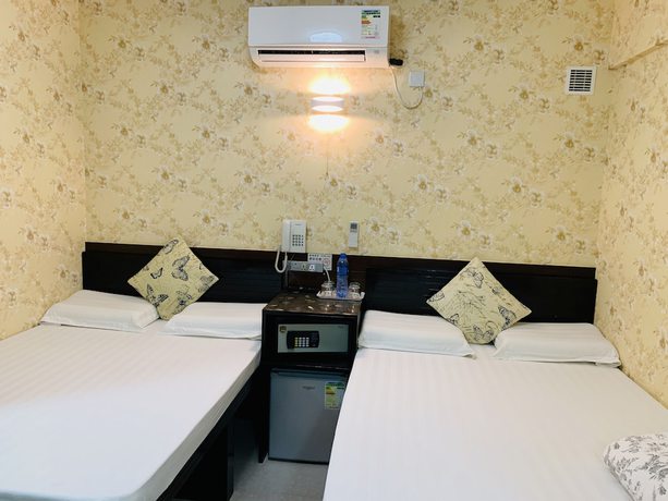 Imagen de la habitación del Hotel Modern, Kowloon. Foto 11