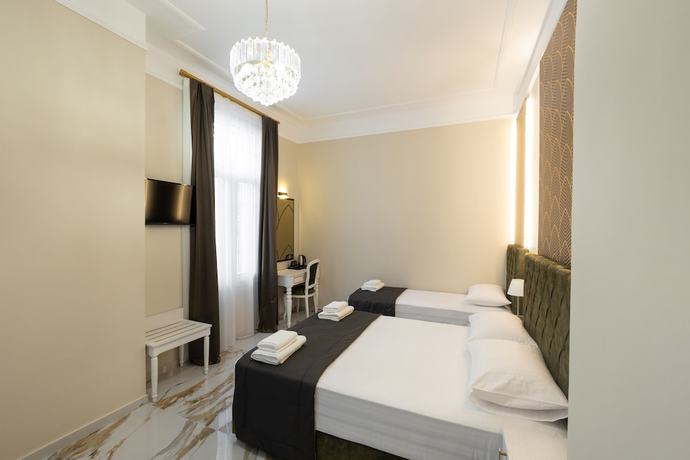 Imagen de la habitación del Hotel Modern Luxury. Foto 20