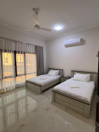 Imagen de la habitación del Hotel Modern desert gate resort. Foto 7