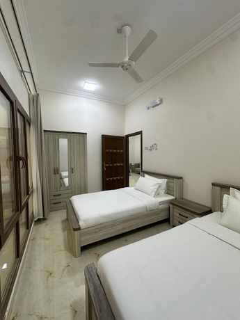 Imagen de la habitación del Hotel Modern desert gate resort. Foto 10