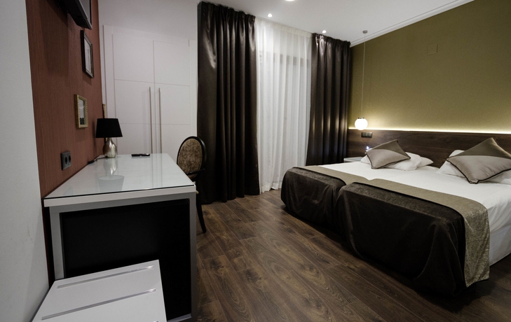 Imagen de la habitación del Hotel Moderno Barcelona. Foto 10