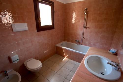 Imagen de la habitación del Hotel Moderno, Olbia. Foto 8