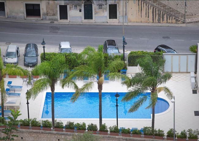 Imagen de la piscina del Hotel Modica Inn Centro, BW Premier Collection. Foto 16
