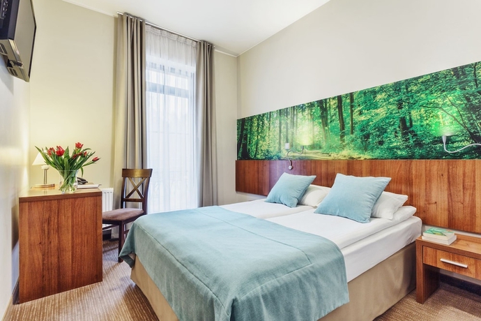 Imagen de la habitación del Hotel Modrzewiowy Dwor. Foto 8