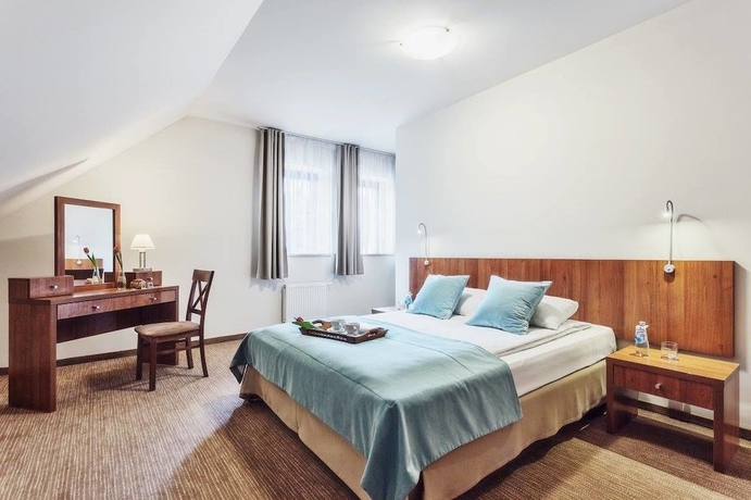Imagen de la habitación del Hotel Modrzewiowy Dwor. Foto 10