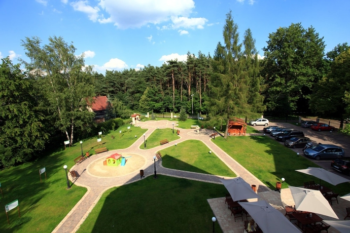 Imagen de los exteriores del Hotel Modrzewiowy Dwor. Foto 13
