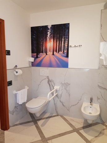 Imagen de la habitación del Hotel Moena. Foto 16