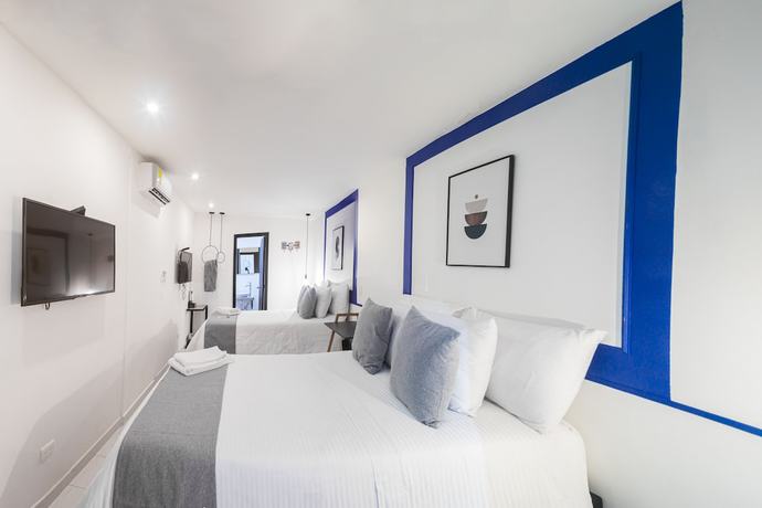 Imagen de la habitación del Hotel Moet Medellin. Foto 16