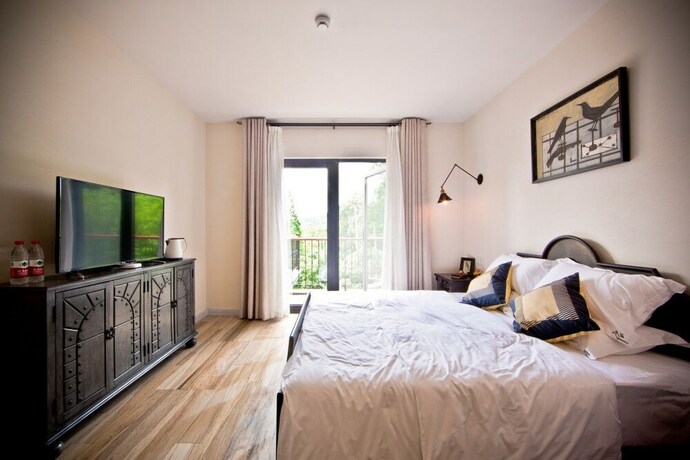 Imagen de la habitación del Hotel Moganshan Banduju. Foto 18