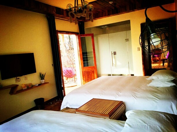 Imagen de la habitación del Hotel Moganshan Jianqi Inn. Foto 12