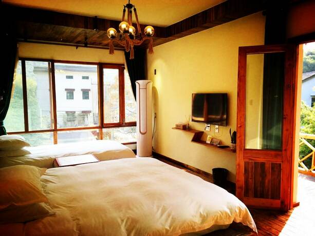 Imagen de la habitación del Hotel Moganshan Jianqi Inn. Foto 13