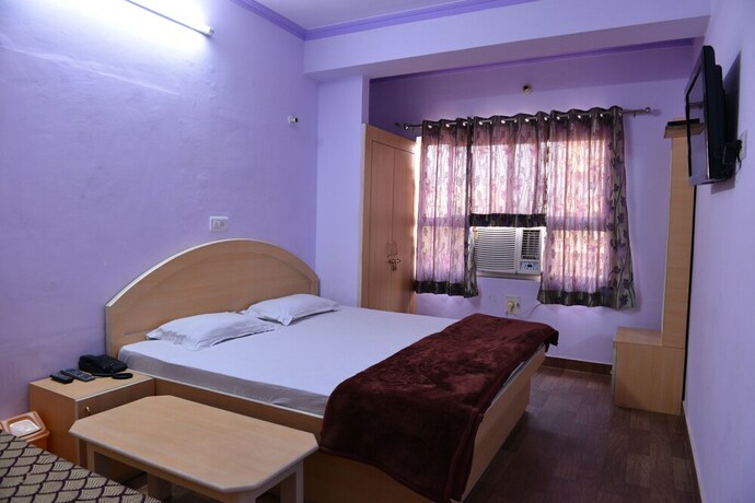 Imagen de la habitación del Hotel Mohit Palace. Foto 27