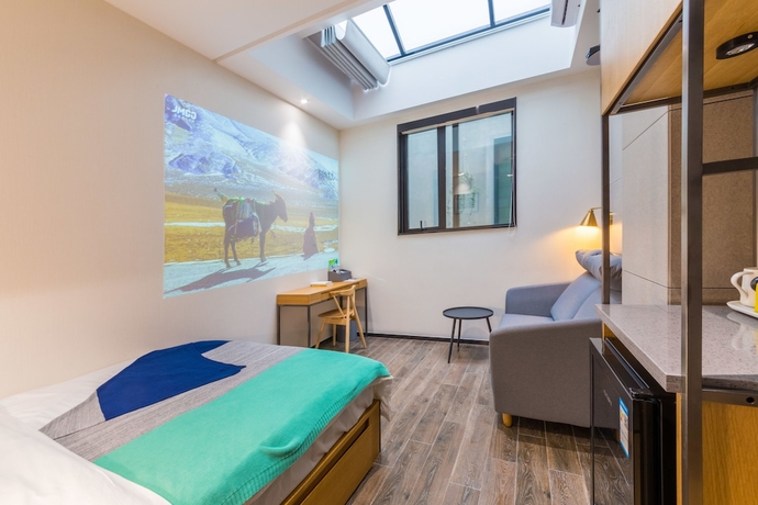 Imagen de la habitación del Hotel Moju Shanghai. Foto 6