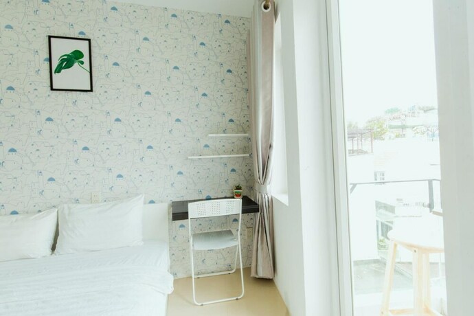 Imagen de la habitación del Hotel Moka's House. Foto 11