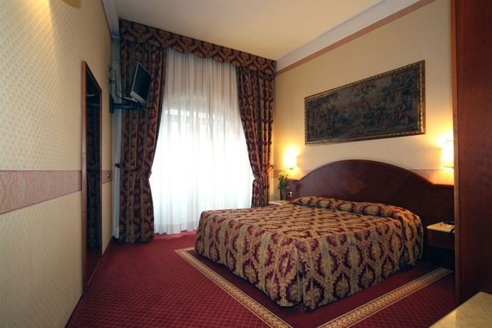 Imagen de la habitación del Hotel Mokinba Hotels King. Foto 10