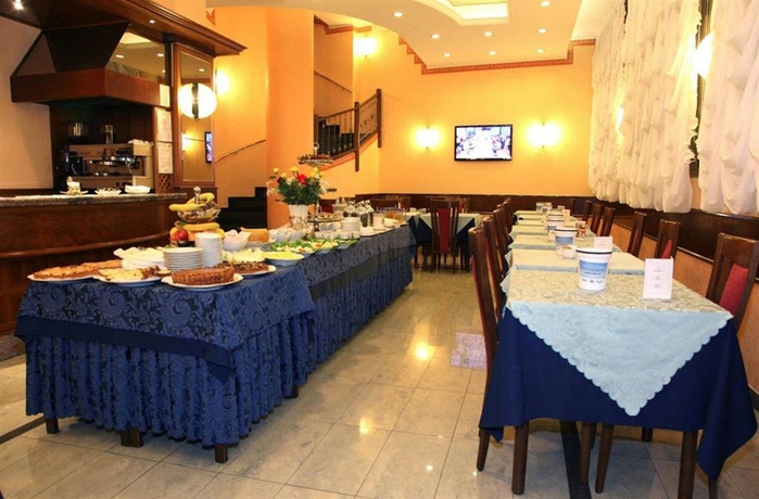 Imagen del bar/restaurante del Hotel Mokinba Hotels King. Foto 3