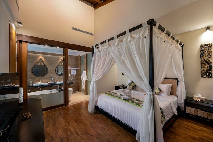 Imagen de la habitación del Hotel Mokko Suites Batubelig. Foto 15