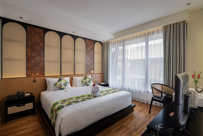 Imagen de la habitación del Hotel Mokko Suites Batubelig. Foto 20