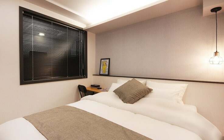 Imagen de la habitación del Hotel Mokpo Haru. Foto 18