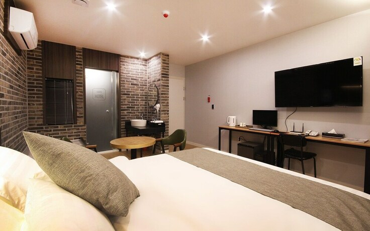 Imagen de la habitación del Hotel Mokpo Haru. Foto 23