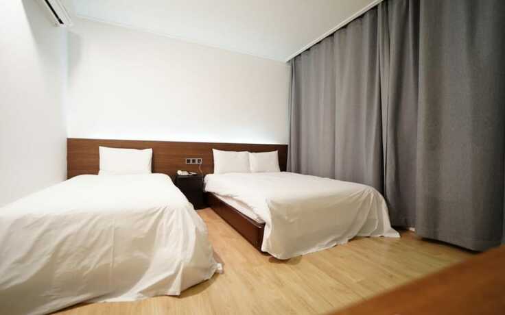 Imagen de la habitación del Hotel Mokpo Utopia Family. Foto 14