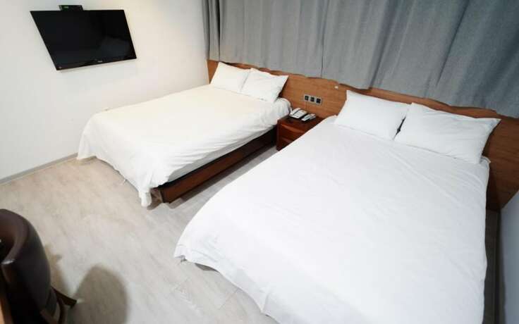 Imagen de la habitación del Hotel Mokpo Utopia Family. Foto 18