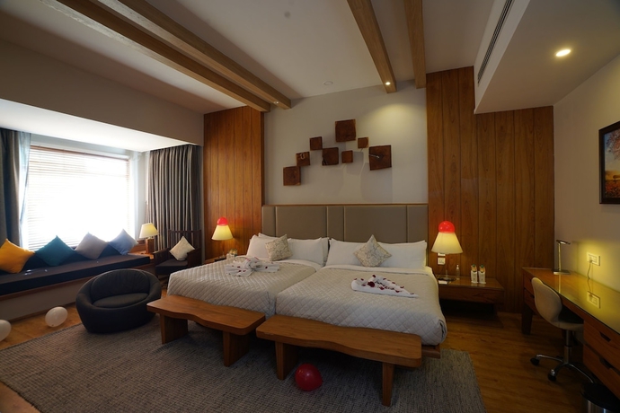 Imagen de la habitación del Hotel Moksha Himalaya Spa Resort. Foto 9