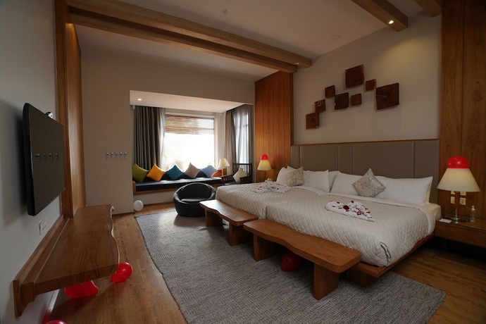 Imagen de la habitación del Hotel Moksha Himalaya Spa Resort. Foto 10