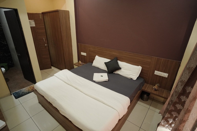 Imagen de la habitación del Hotel Mokshita. Foto 8