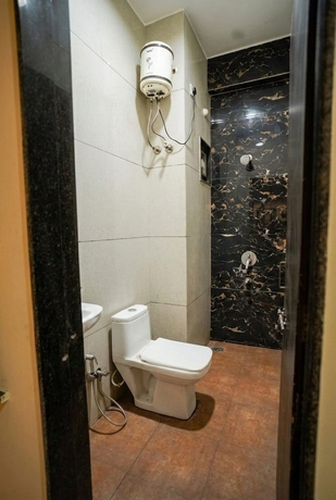 Imagen de la habitación del Hotel Mokshita. Foto 12