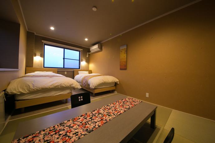 Imagen de la habitación del Hotel Mokuren. Foto 6
