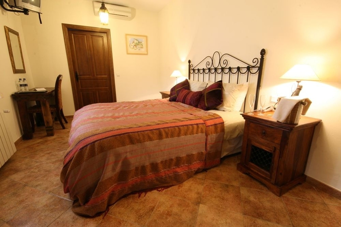 Imagen de la habitación del Hotel Molino Del Puente Ronda. Foto 4