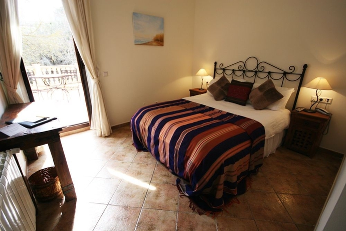 Imagen de la habitación del Hotel Molino Del Puente Ronda. Foto 6