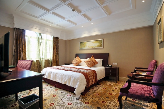Imagen de la habitación del Hotel Moller Villa Shanghai. Foto 2
