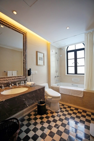 Imagen de la habitación del Hotel Moller Villa Shanghai. Foto 3