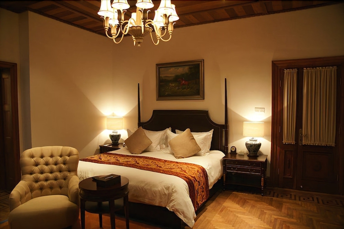 Imagen de la habitación del Hotel Moller Villa Shanghai. Foto 4