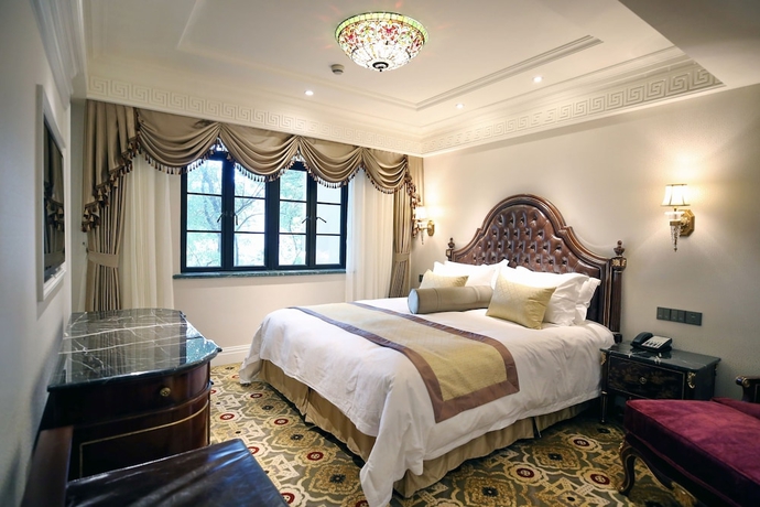 Imagen de la habitación del Hotel Moller Villa Shanghai. Foto 6