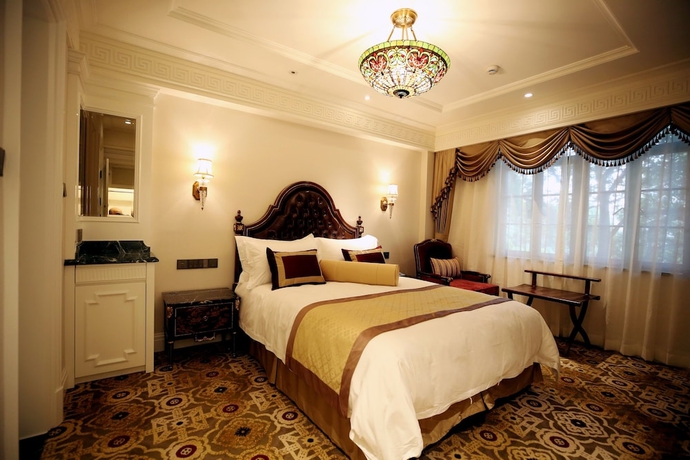 Imagen de la habitación del Hotel Moller Villa Shanghai. Foto 7