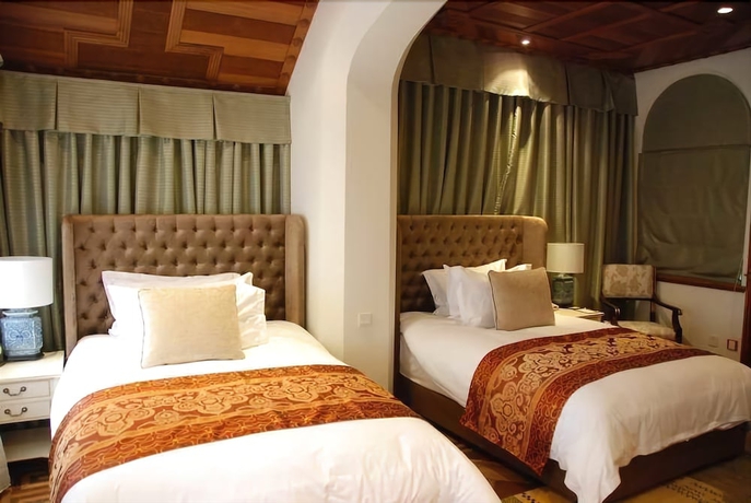Imagen de la habitación del Hotel Moller Villa Shanghai. Foto 8