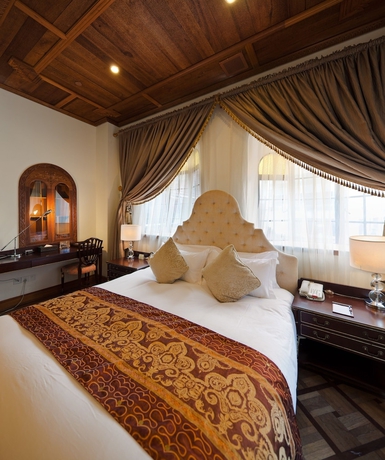 Imagen de la habitación del Hotel Moller Villa Shanghai. Foto 9