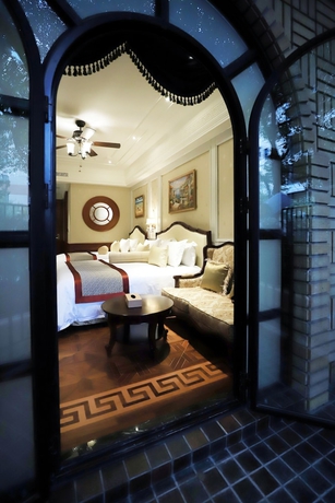 Imagen de la habitación del Hotel Moller Villa Shanghai. Foto 10