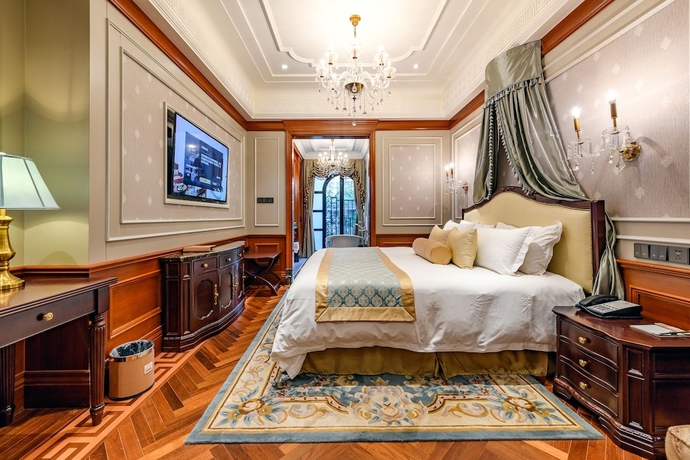 Imagen de la habitación del Hotel Moller Villa Shanghai. Foto 11