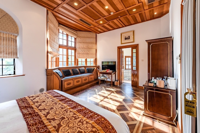 Imagen de la habitación del Hotel Moller Villa Shanghai. Foto 15