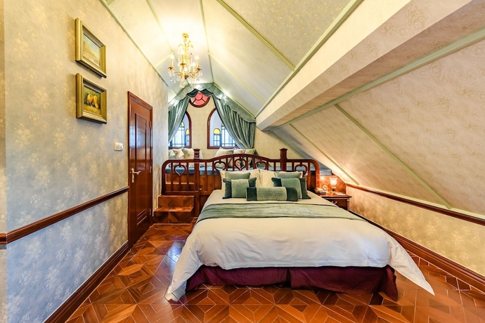 Imagen de la habitación del Hotel Moller Villa Shanghai. Foto 17