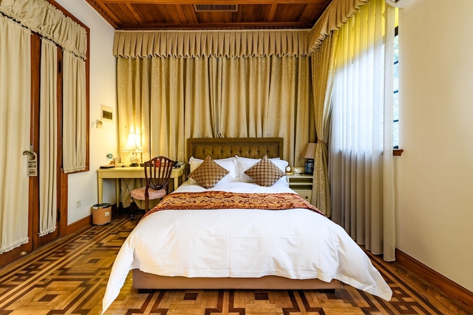 Imagen de la habitación del Hotel Moller Villa Shanghai. Foto 18