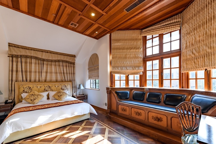 Imagen de la habitación del Hotel Moller Villa Shanghai. Foto 19